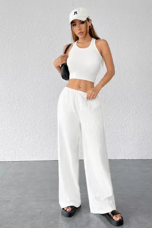 Kadın Beyaz Bol Kesim Cepli Geniş Paça Dökümlü Pantolon