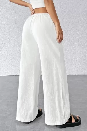 Kadın Beyaz Bol Kesim Cepli Geniş Paça Dökümlü Pantolon