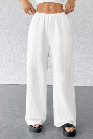 Kadın Beyaz Bol Kesim Cepli Geniş Paça Dökümlü Pantolon